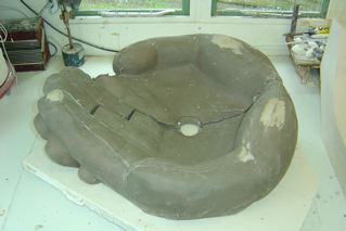 Clay model of "hands" Basin mould